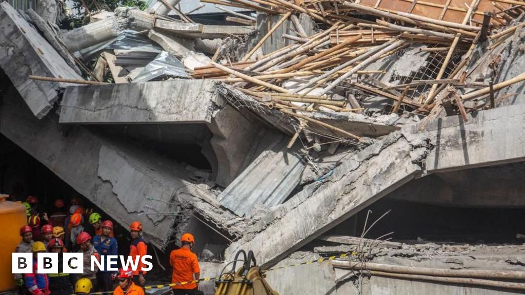 Three dead, dozens trapped after school collapses on students